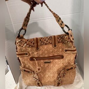 Isabella Fiore Embroidered
Angelina Hobo Handbag, Almost New
Condition